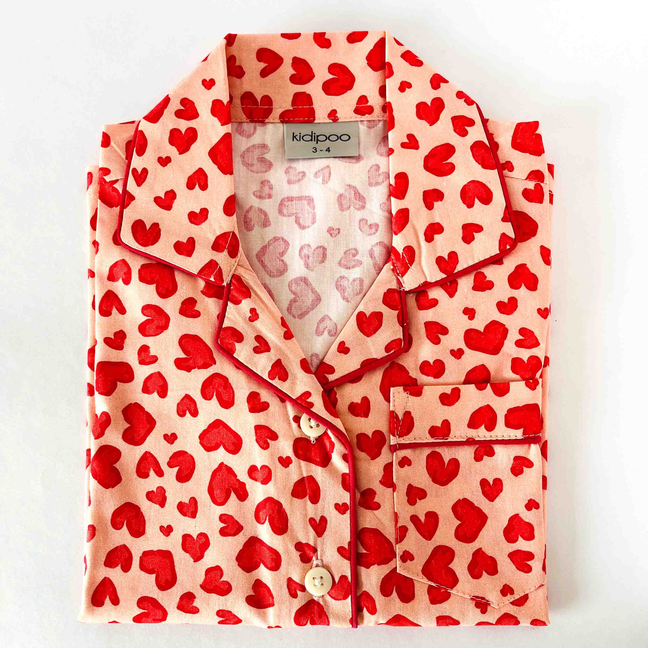 Kids cotton night shirt with pink hearts print and long sleeve button-down style