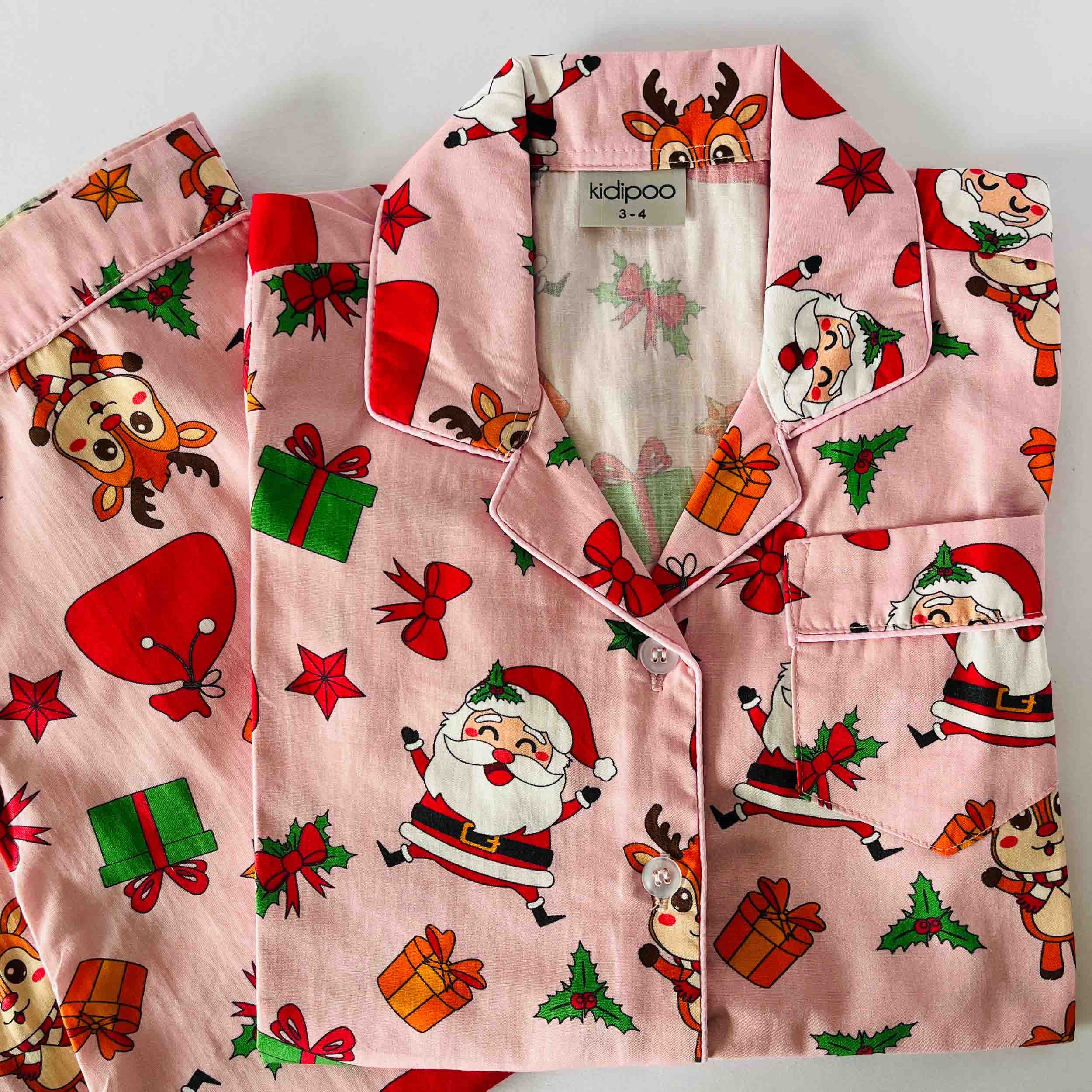 Pink Santa print kids night suit soft cotton sleepwear set folded view