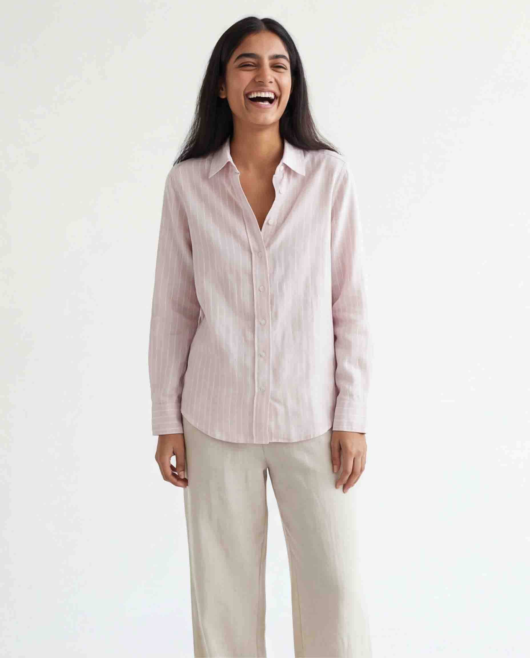 Women's light pink stripe shirt long sleeves front button style casual outfit