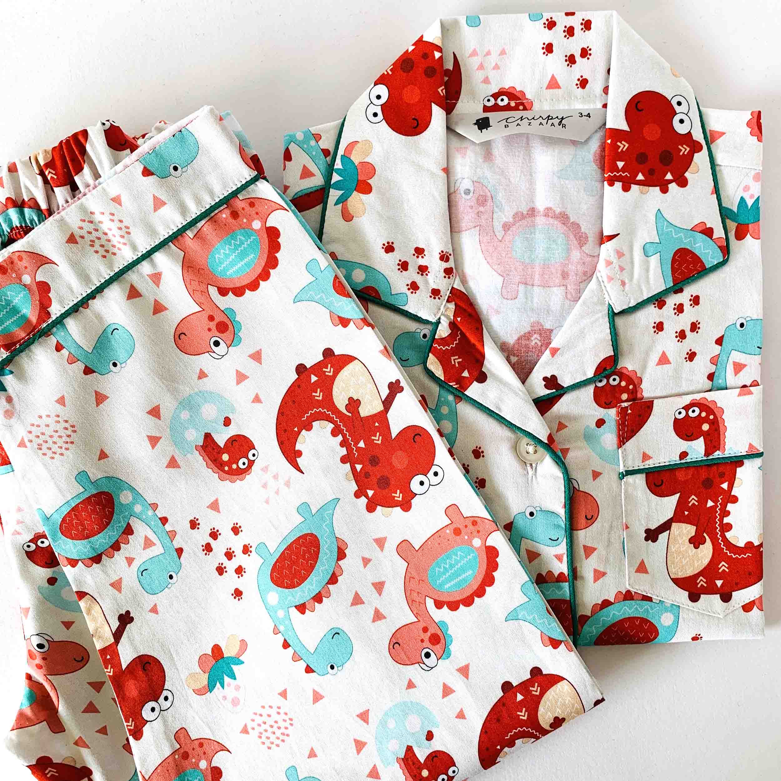 Kids dino and animal print cotton night suit with long sleeve front button shirt and pajama set