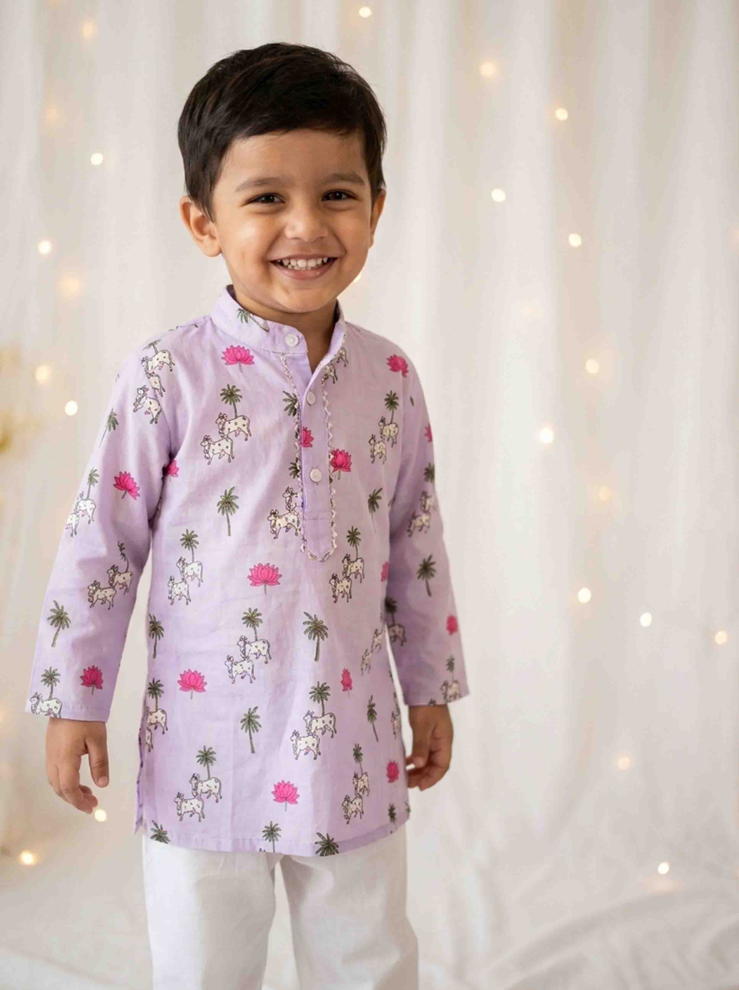 Purple floral printed kurta pajama for boys, featuring a traditional festive design