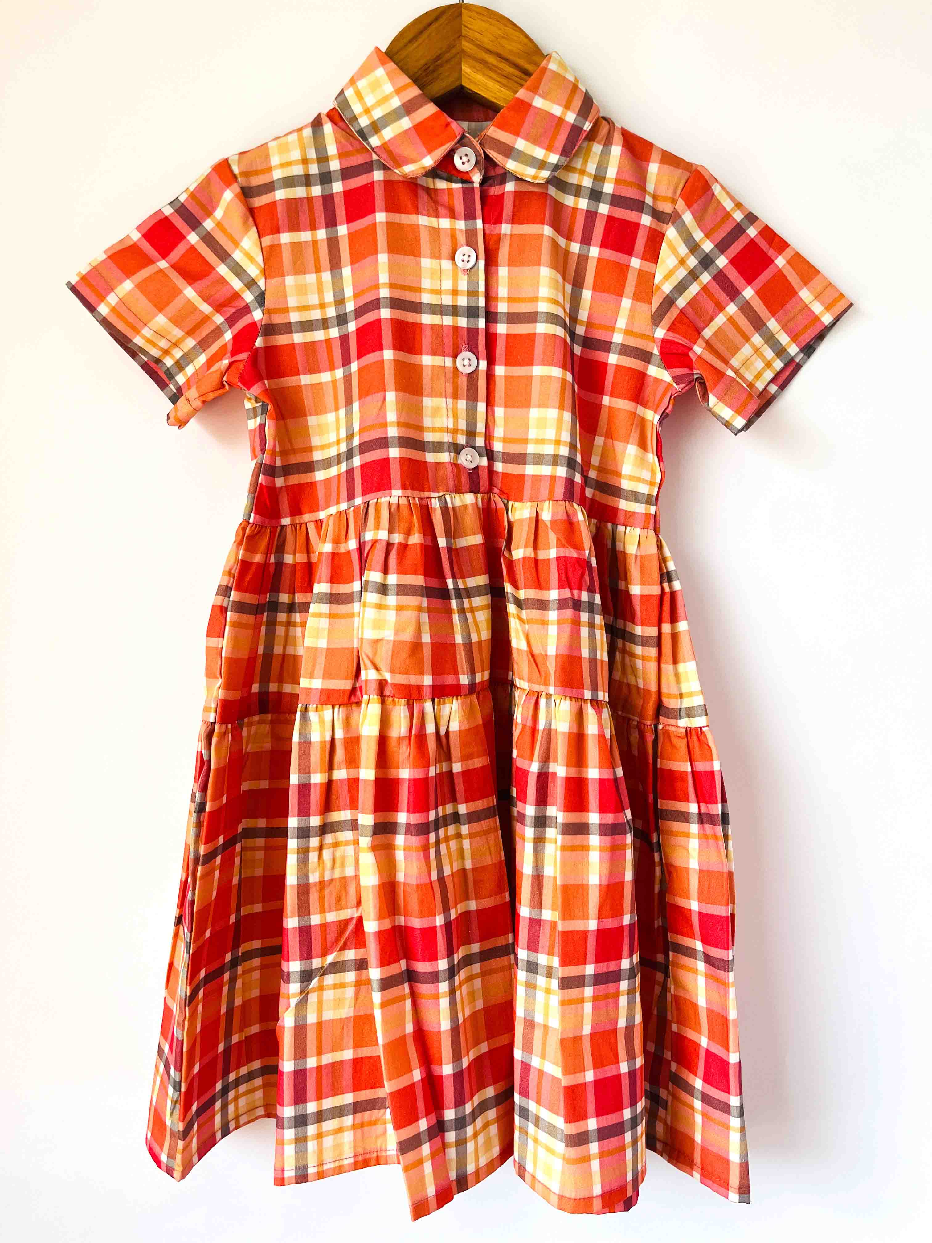 Kids red check cotton dress with short sleeves and front button design