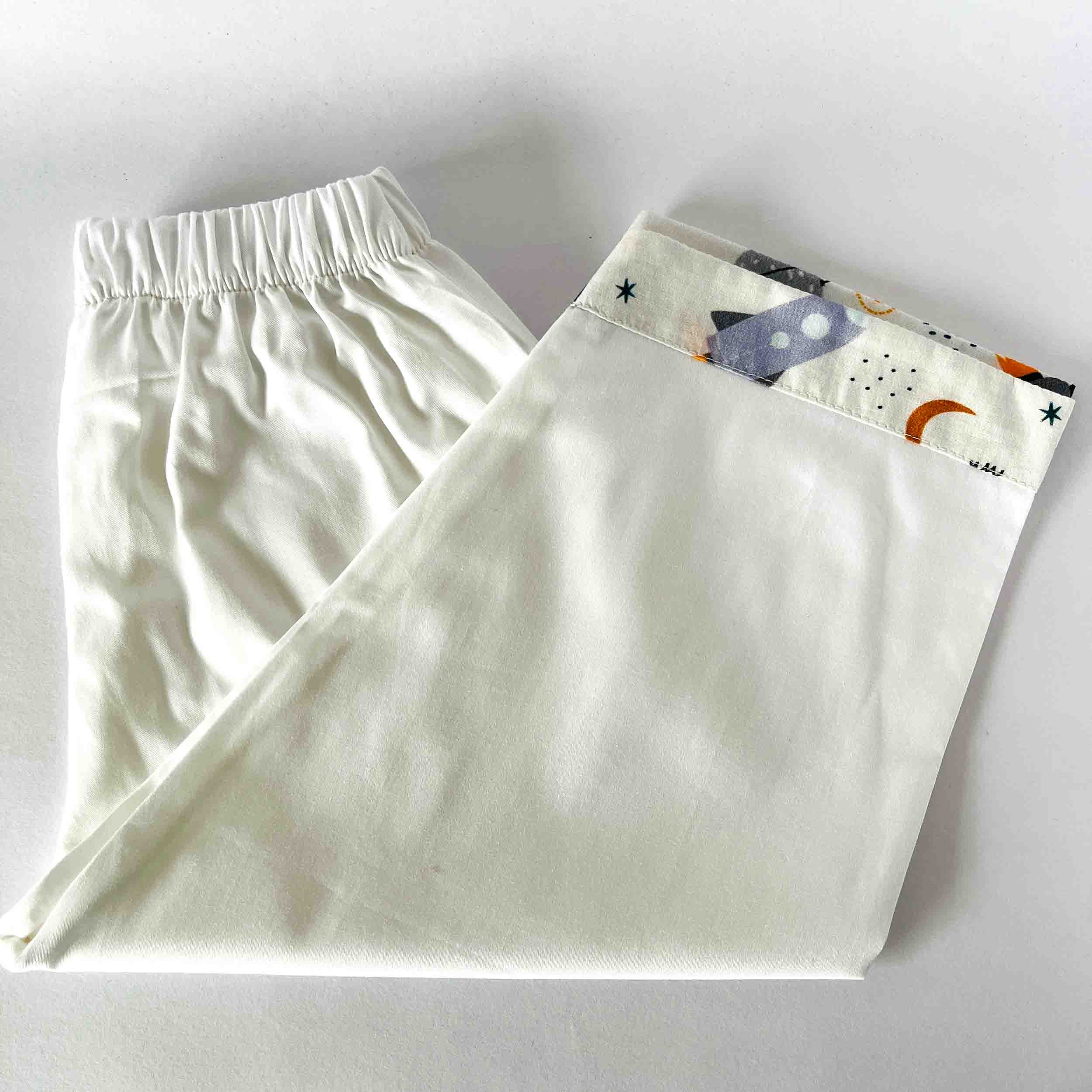 Kids white cotton pajama pants with rocket print elastic waist soft breathable nightwear bottom comfortable sleepwear for boys and girls