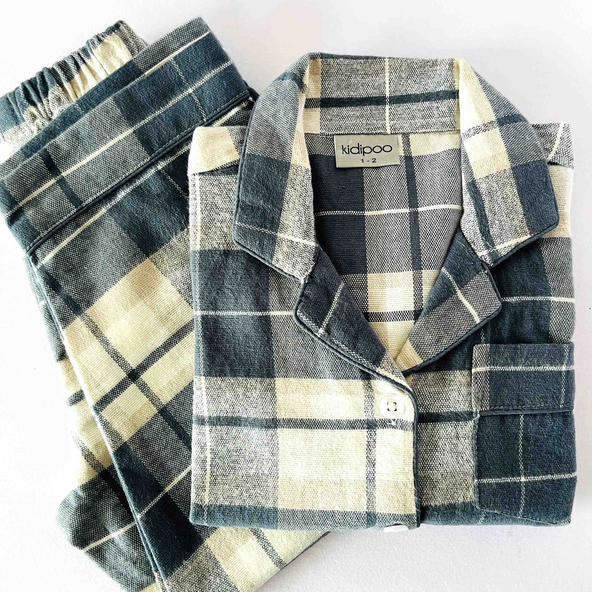 Royal flannel night suit for kids in green checkered print soft cotton sleepwear set folded view
