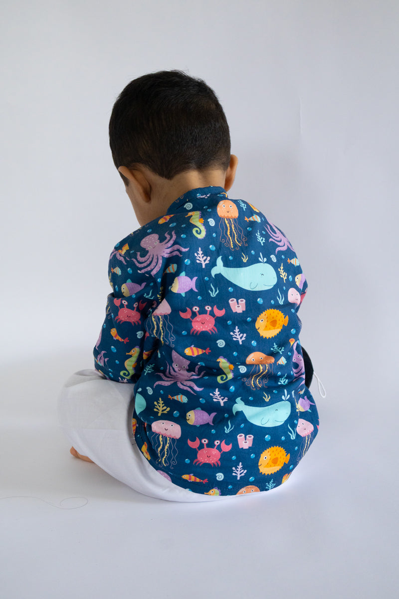 "Kid wearing Kidipoo sea creatures print cotton kurta pajama set back view kids outfit"