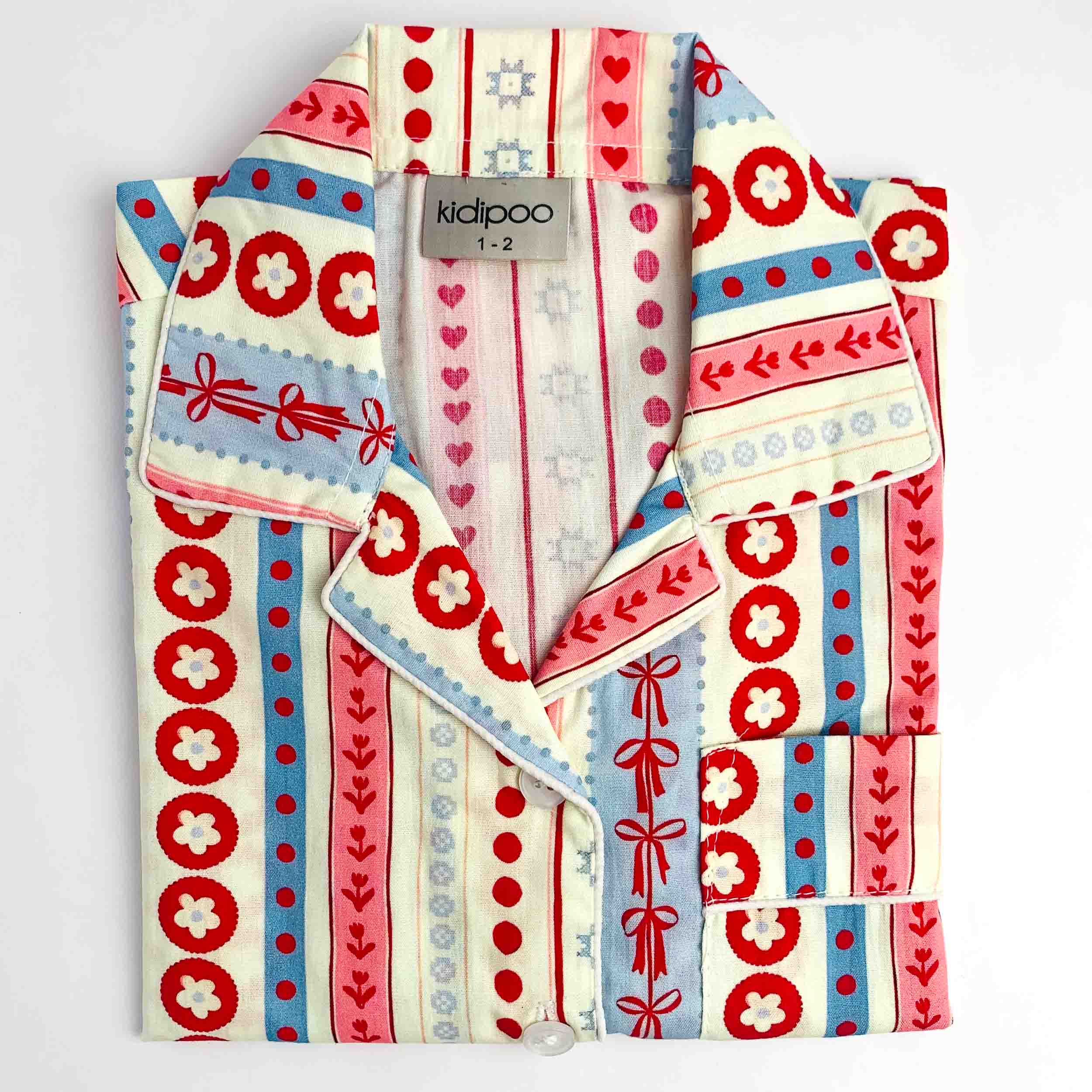Kids printed full sleeve button-up night suit shirt featuring red, blue, and cream stripes, dots, and heart pattern