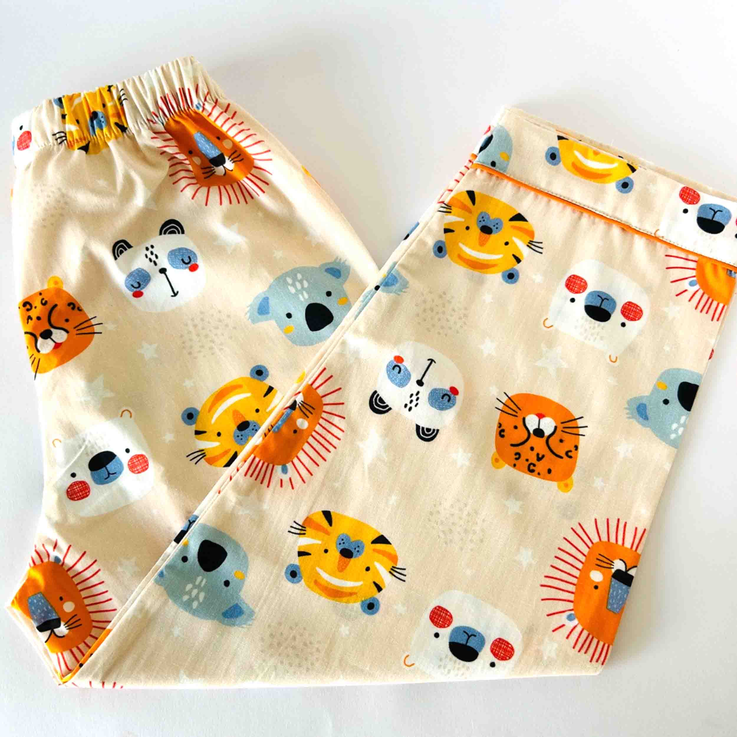 Two fabric swatches with animal pattern on a white background