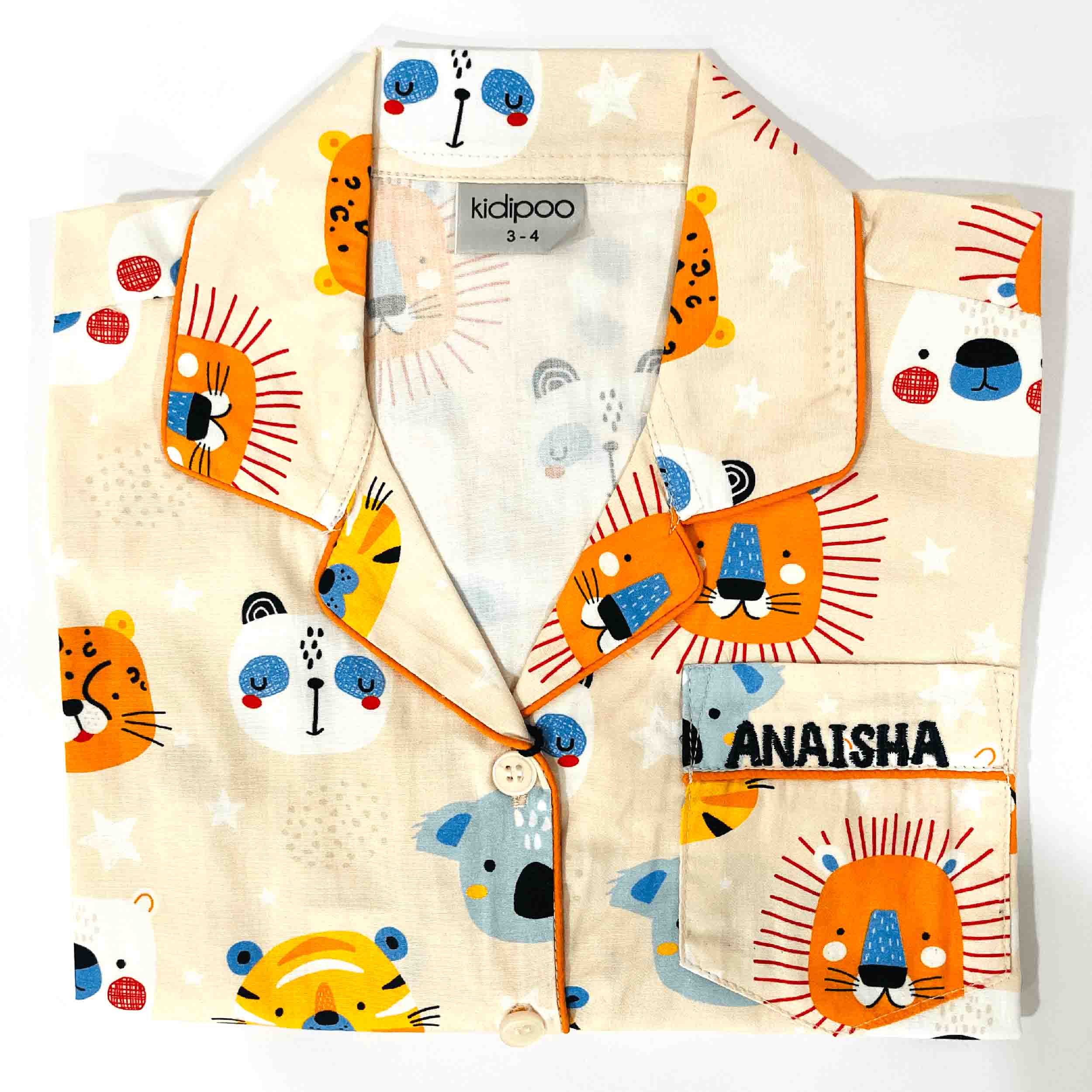 Children's outfit with cartoon animal design on a white background