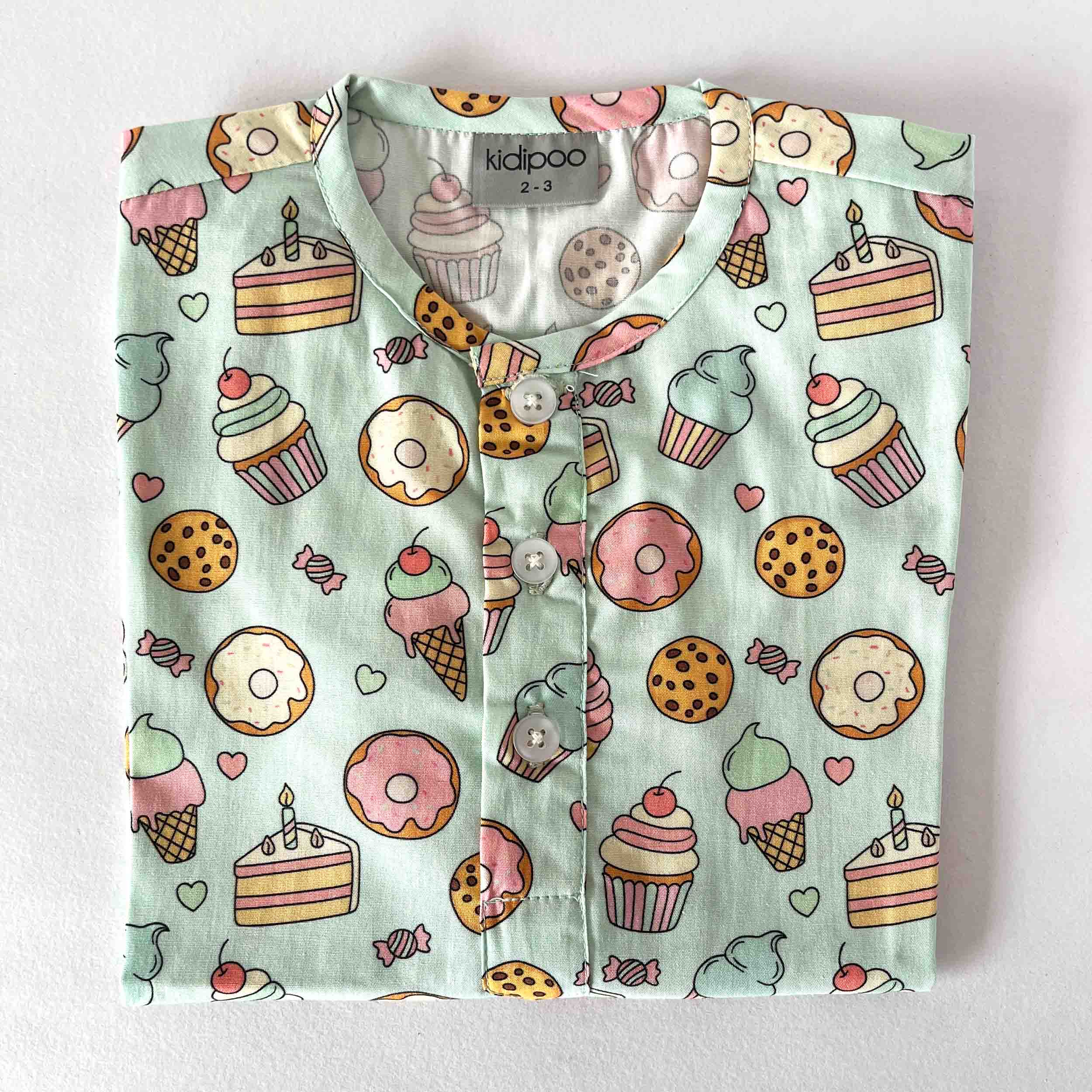 Kids cotton night shirt with sweet treats print and round neck long sleeve design
