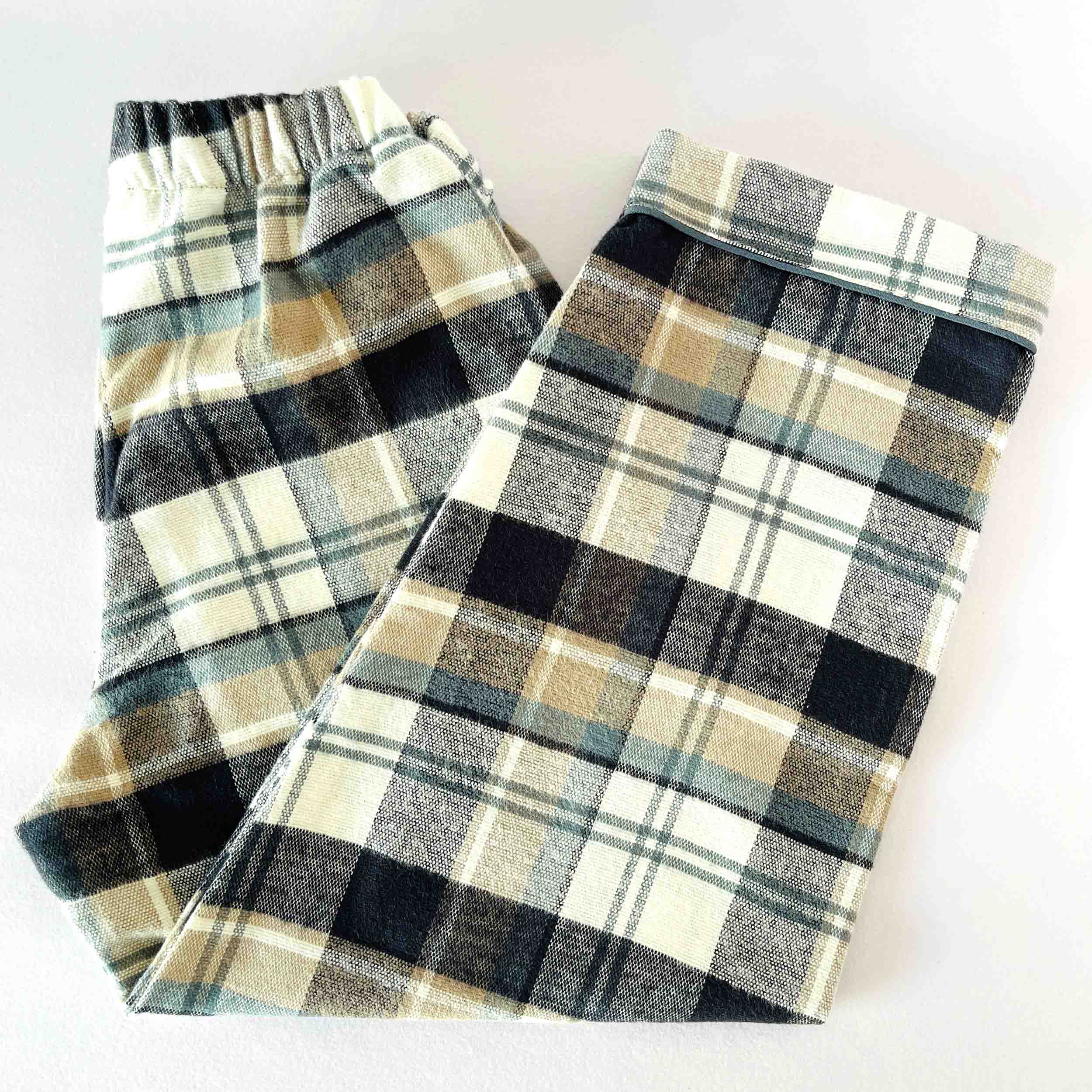 Plaid flannel pants on a white background