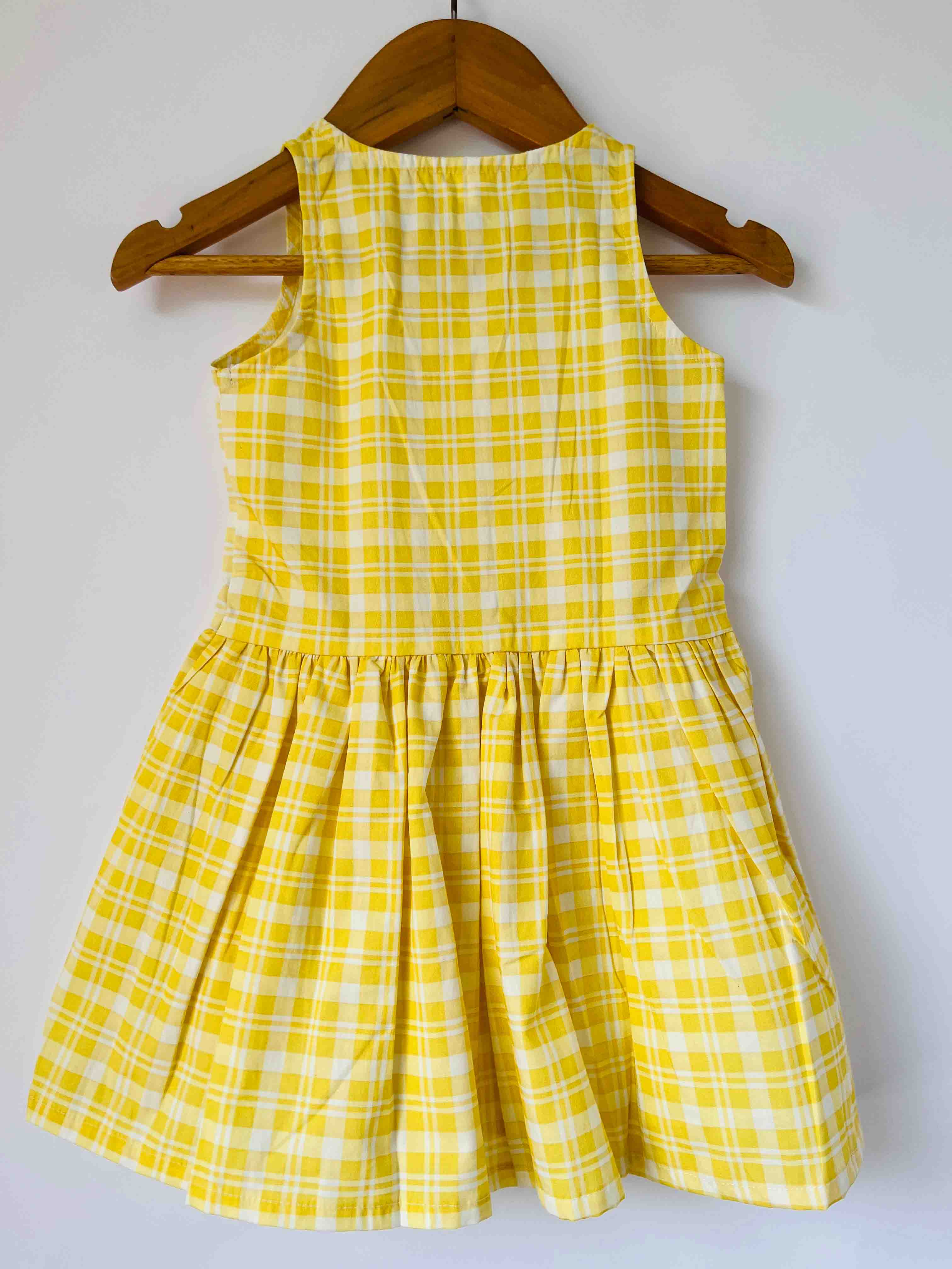 Yellow checked cotton kids dress with sleeveless design
