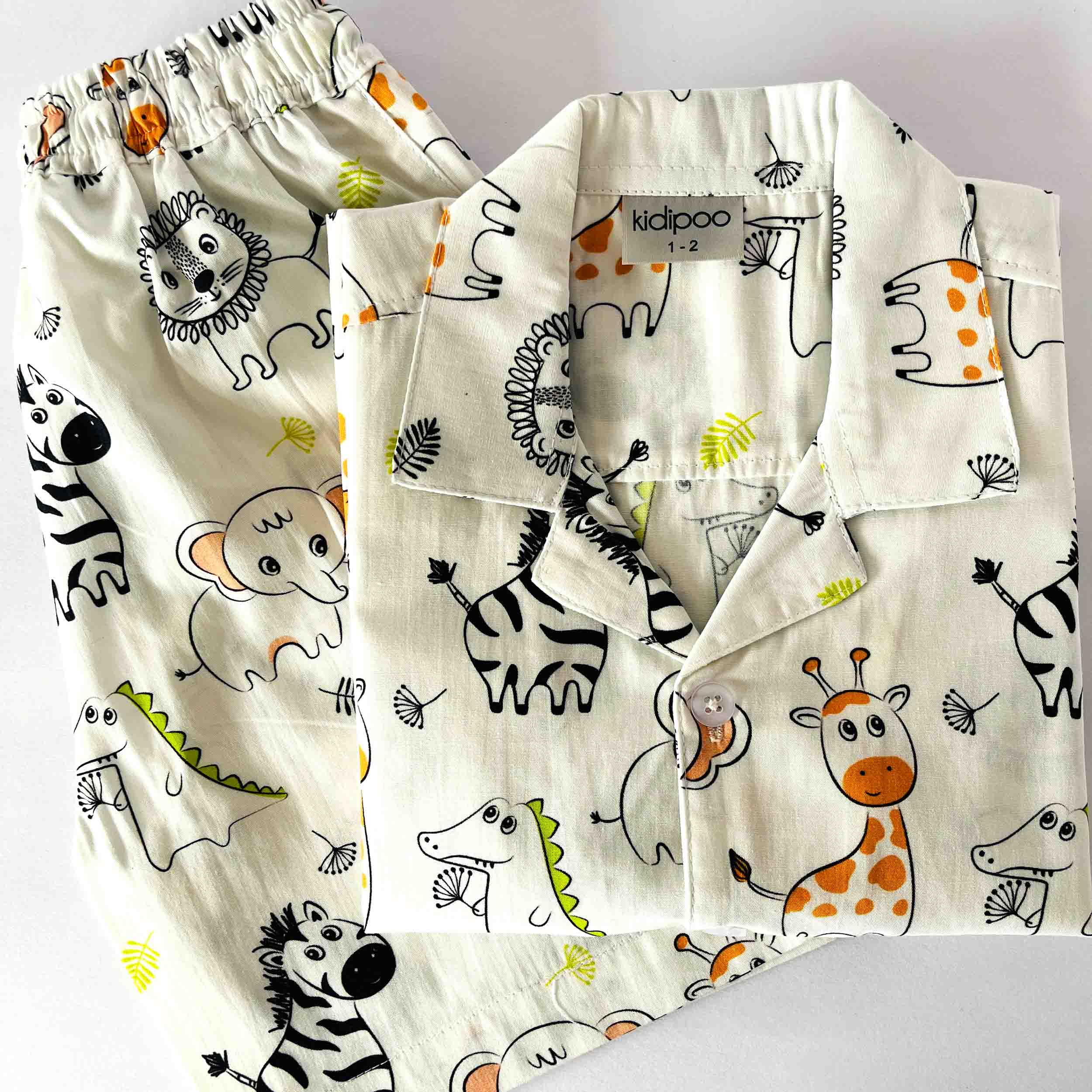 Kids zoo animal print muslin cotton coord set with half sleeve front button shirt and elastic waist shorts soft breathable summer outfit made from 100% premium cotton for boys and girls